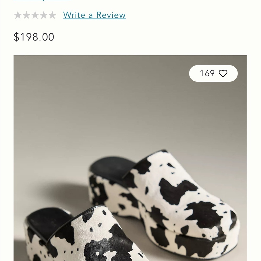 Lisa Says Gah Black and White Cow Print Mules